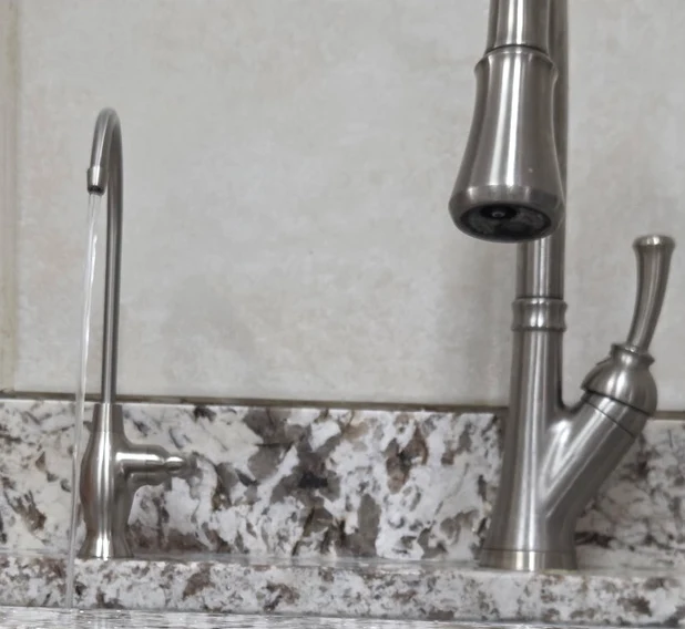 Brushed-nickel drinking-water faucet