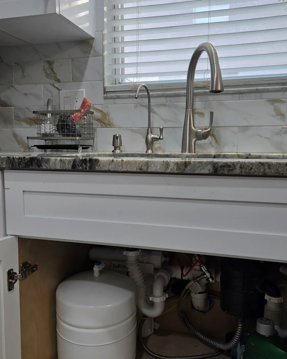 Brushed-nickel HydroSip RO™ drinking-water faucet with the under-sink reverse-osmosis system visible below